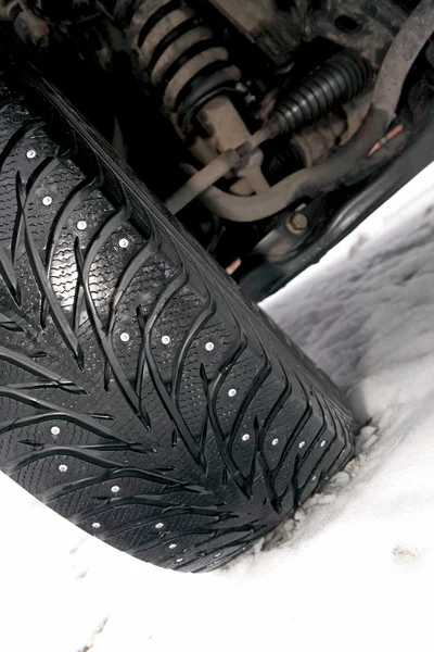 Car tire in the winter way — Stock Photo, Image