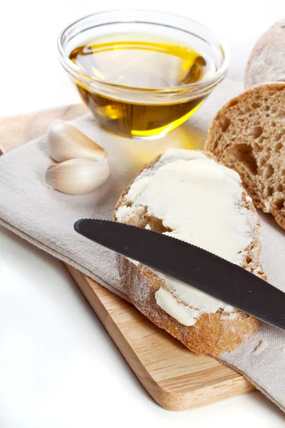 Fresh ciabatta with olive oil and butter Stock Picture