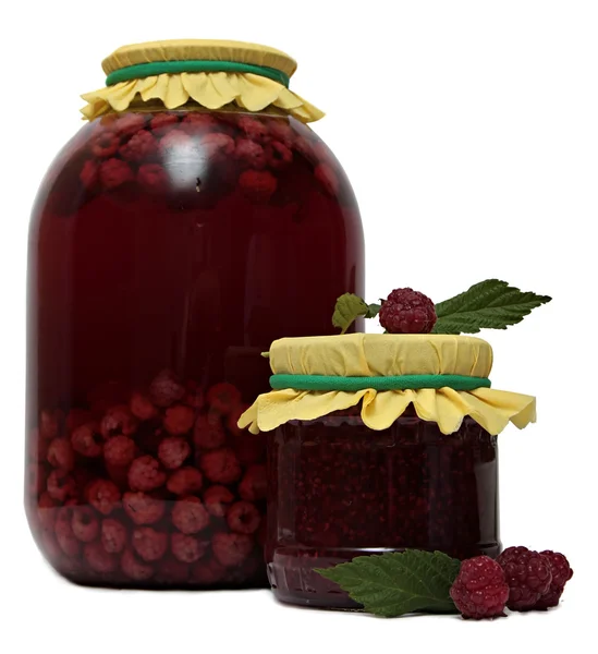 Glass jar of stewed fruit, jam and fresh raspberries. Shot in Studio isolated white background. — Stock Photo, Image