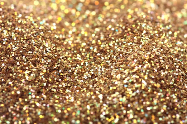 Gold nuggets sparkling carpet. Close-up view, very shallow deep of field . Macro. — Stock Photo, Image