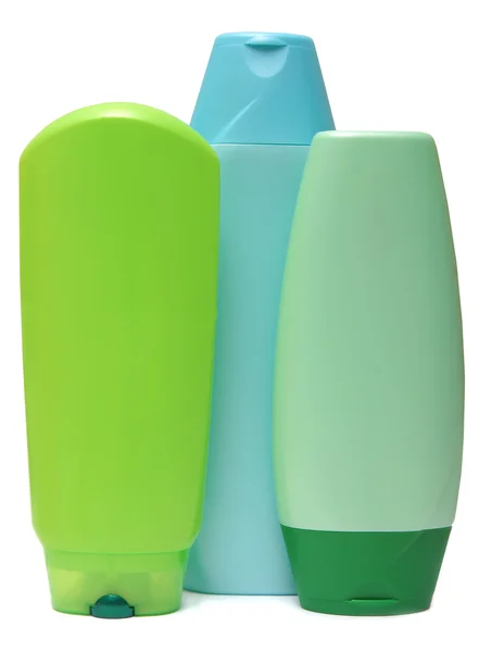 Färgade plastflaskor med flytande tvål och duschtvål. — Stockfoto