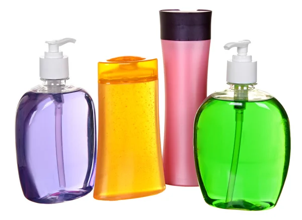 Colored plastic bottles with liquid soap and shower gel. — Stock Photo, Image