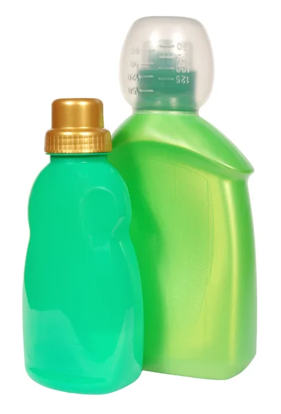 Reiniging van apparatuur .colored plastic flessen met wasmiddel geïsoleerd op witte achtergrond . — Stockfoto