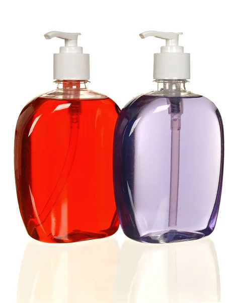 Bottiglie di plastica colorate con sapone liquido e gel doccia . — Foto Stock