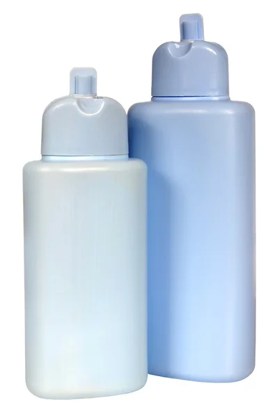 Bouteilles en plastique colorées avec savon liquide et gel douche . — Photo