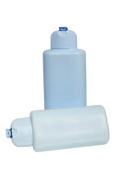 Zamknięte kosmetyczne lub higieny niebieski butelki z tworzyw sztucznych żel, mydła w płynie, balsam, krem, szampon. Na białym tle. — Zdjęcie stockowe
