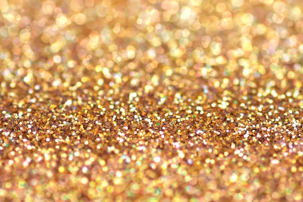 Gold nuggets sparkling carpet. Close-up view, very shallow deep of field . Macro. — Stock Photo, Image