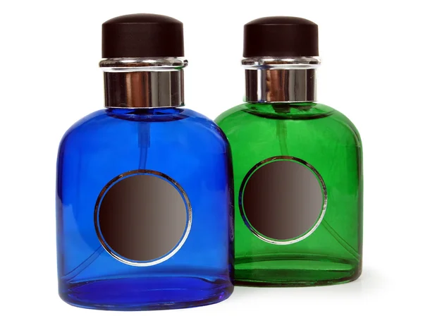 Glasflaskor parfym isolerad på vit bakgrund. Studio-fotografering. — Stockfoto