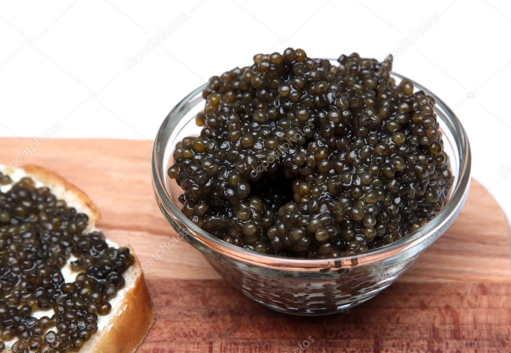 Black and red caviar in glass container