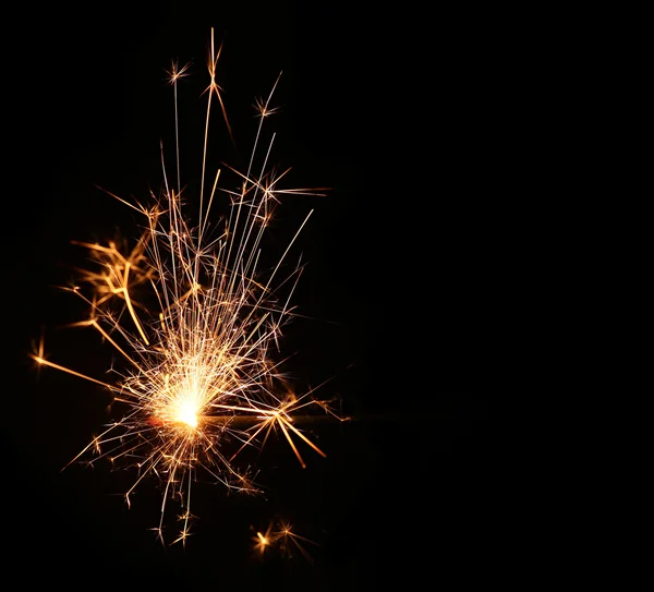 Sparkler. Natal e festa de ano novo sparkler em preto — Fotografia de Stock