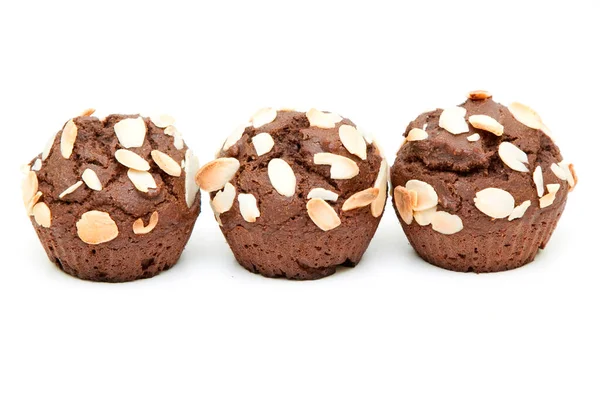 Chocolade Muffins Met Een Vulling Van Noten Geïsoleerd Een Witte — Stockfoto