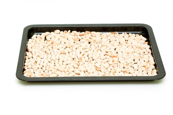 Erdnüsse Auf Tablett Isoliert Auf Weißem Hintergrund — Stockfoto