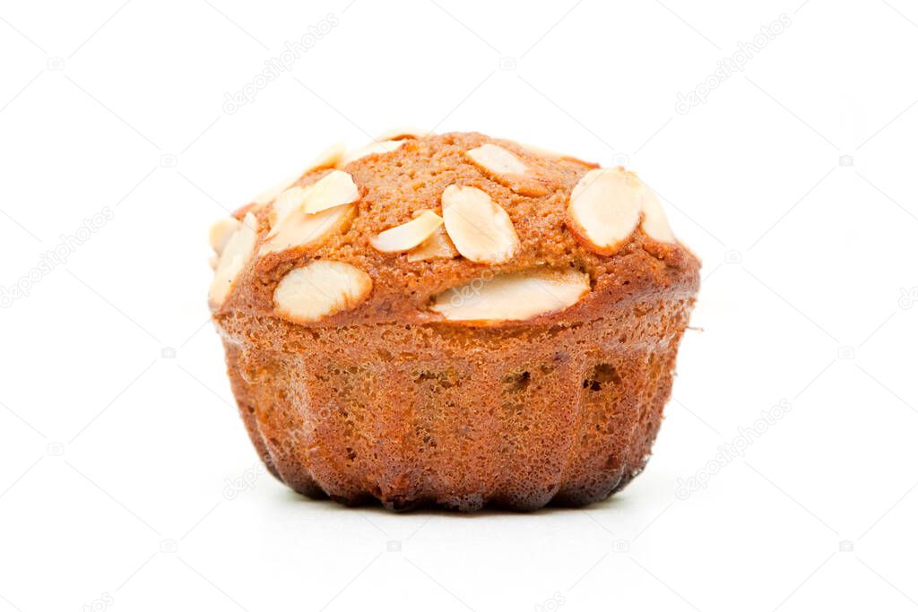 Peanut muffin with almonds isolated on a white background
