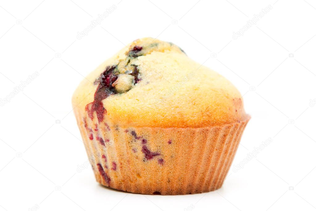 Muffins with berries isolated on a white background