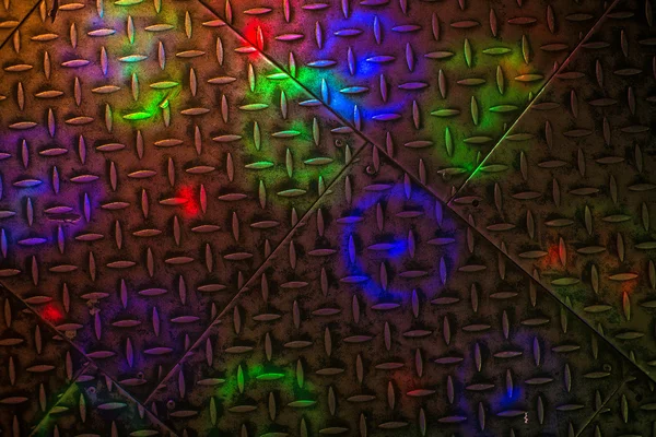 A fém padlóra színes zene. — Stock Fotó