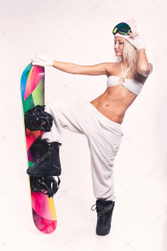 Girl with snowboard.