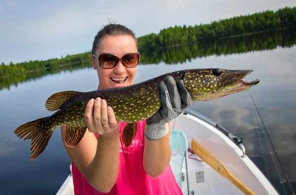 Woman fishing pike — Stock Photo, Image