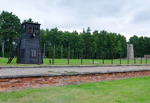 Barrack ruins and border tower in concentration camp Stutthof — Stock Photo, Image