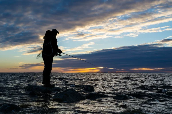 Pesca in mare la sera — Foto Stock