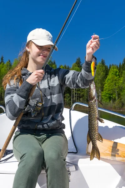 Teenager fishing pike — Stock Photo, Image