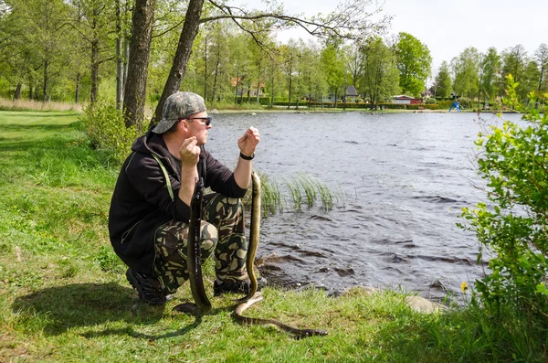 Angler with eels — Stock Photo, Image