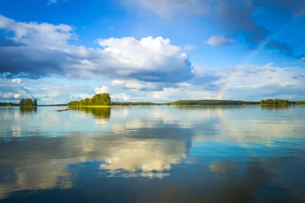 Swedish lake scenery with rainbow — Stock Photo, Image