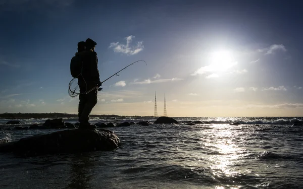 Pesca de invierno en la costa sueca —  Fotos de Stock