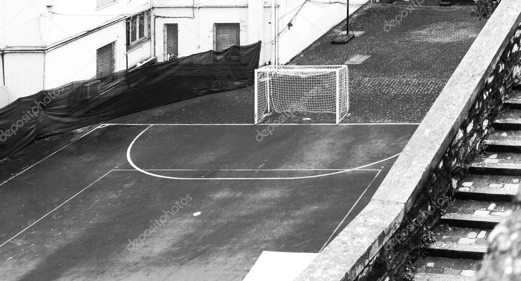 small soccer field within a courtyard