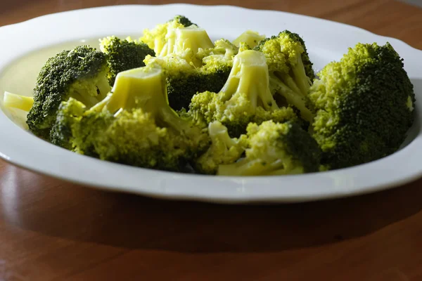 Steamed broccoli in a plate close up — Stock Photo, Image