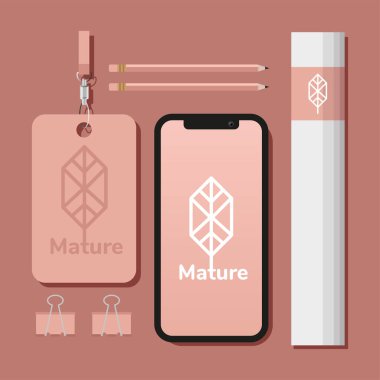 Pembe arkaplandaki ögeleri düzenleyen bir demet maket içeren kimlik kartı