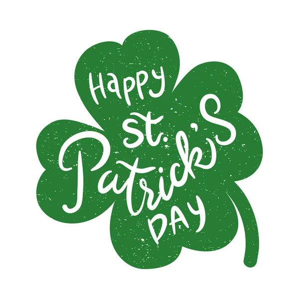 Heureux saint patricks jour lettrage dans trèfle feuilles — Image vectorielle