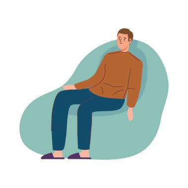 Kanepede oturan adam.