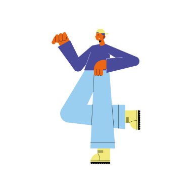 Genç adam ayakta duruyor.