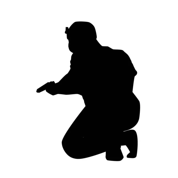 Soldier crouched with weapon — Stock Vector