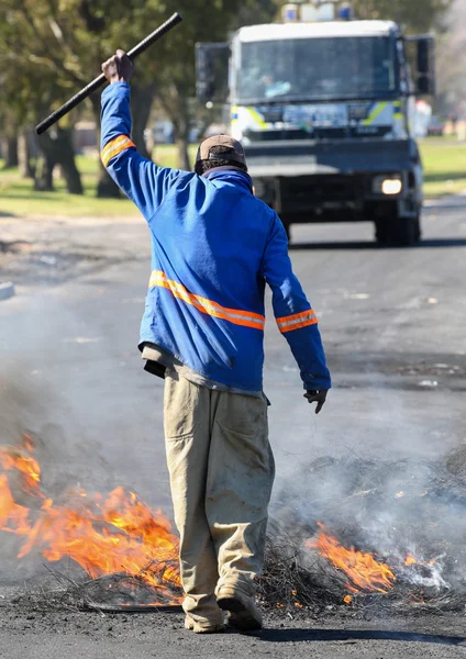 Protestaktion mit brennenden Reifen Stockbild