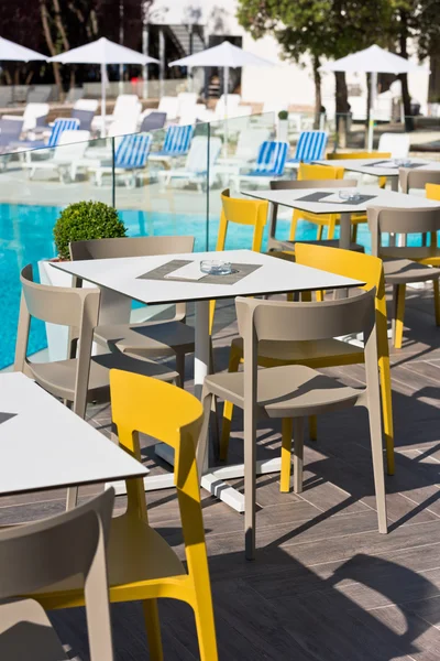 Summer cafe with plastic furniture — Stock Photo, Image