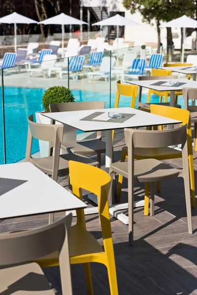 Summer cafe with plastic furniture