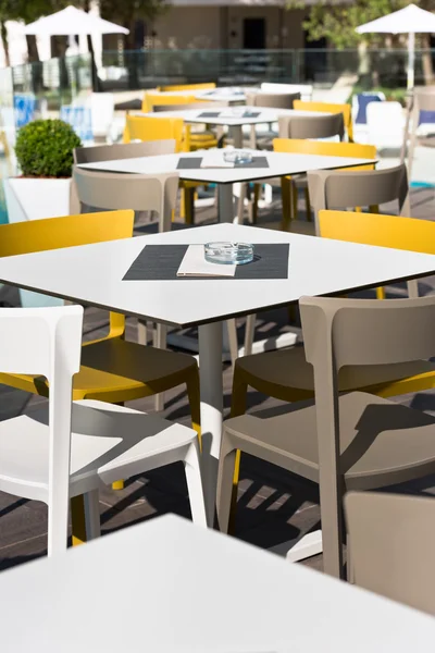 Summer cafe with plastic furniture — Stock Photo, Image