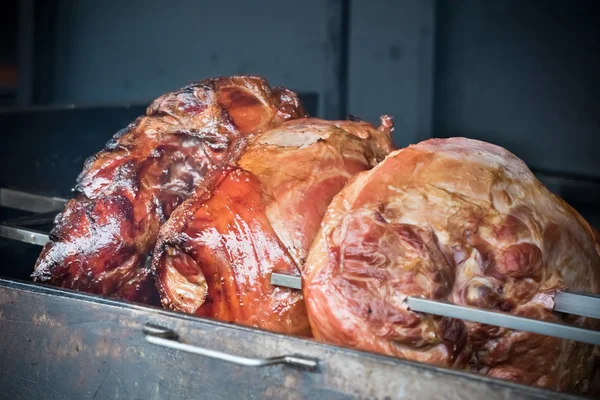 Roasted pig knuckle on the spit — Stock Photo, Image