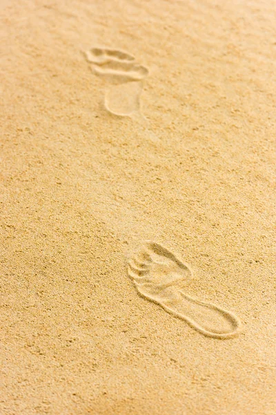 Human footprints on the sand