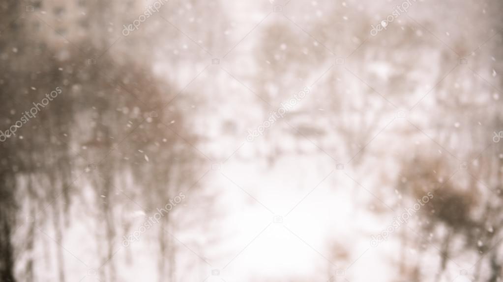Winter blur background with snowflakes