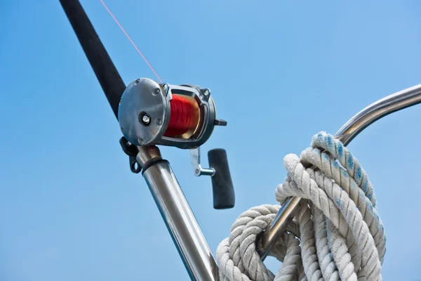 Fishing rod and reel on a yacht — Stock Photo, Image