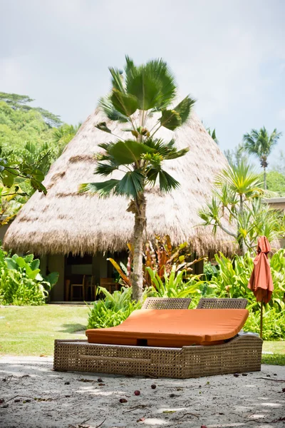 Beach bed on white sand — Stock Photo, Image