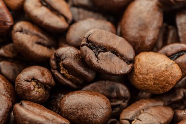 Kavrulmuş kahve çekirdekleri, arka plan olarak kullanılabilir.