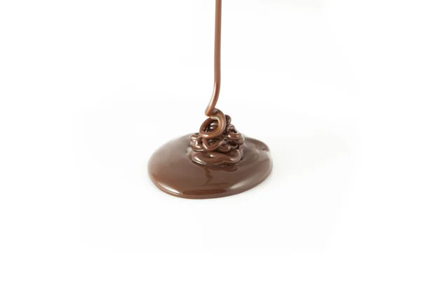 Chocolate caindo de cima — Fotografia de Stock