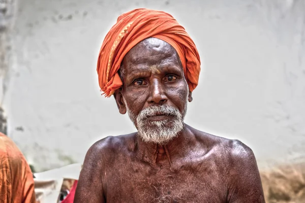 Holy Sadhu men  in saffron color clothing — Stock Photo, Image