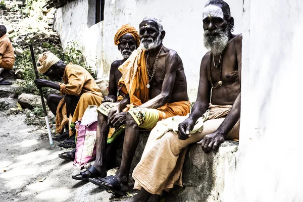 Holy Sadhu men  in saffron color clothing — Stock Photo, Image