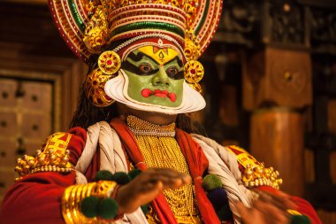 Kathakali performer in the virtuous pachcha (green) role in Cochin clipart