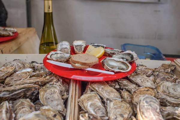 Fresh oysters plate on festival market