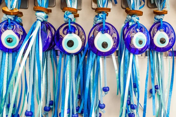 Evil eye bead protection amulet in the shop or market. One of the most popular souvenirs